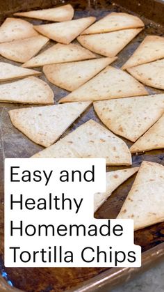 tortilla chips on a baking sheet ready to go into the oven