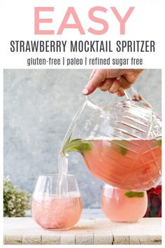 a pitcher filled with strawberry mojita spritzer