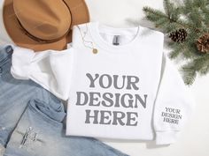 Gildan 18000 Sleeve Folded Sweatshirt Mockup  1 Hi-res 300 dpi JPG image (3000x2250px) in RGB Elevate your holiday and seasonal designs with this premium White Gildan 18000 crewneck sweatshirt mockup! Perfect for showcasing your Christmas, fall, and winter sweater designs, this mockup features a rich forest green hue that adds a cozy, festive touch to your creations. Key Features: High-Quality Gildan 18000 Mockup: Show off your designs on a classic Gildan crewneck sweatshirt, known for its comfort and durability.  Versatile Use: Ideal for Christmas, autumn, or winter-themed apparel designs. Easily incorporate your artwork or SVG files for a professional presentation.  Realistic Details: Capture the true essence of your designs with this lifelike mockup, highlighting every stitch and fabric Winter Custom Print Tops With Relaxed Fit, Winter Tops With Custom Print And Relaxed Fit, Winter Sweatshirt With Custom Print And Relaxed Fit, Winter Custom Print Relaxed Sweatshirt, Casual Customizable T-shirt For Winter, Winter Custom Print Relaxed Fit Sweatshirt, Customizable Winter Streetwear Tops, Customizable Crew Neck T-shirt For Winter, Sweater Svg