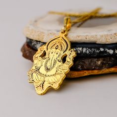 14K Solid Gold Ganesha Necklace, Gold Ganesha Pendant, Hindu Jewelry, Remover Obstacles, Lord Ganesha, Spiritual Gift, Elephant Gods Pendant Details 💎 Gold KT: 14K Solid Gold or 8K Solid Gold 💎Gold Color Options: Yellow Gold, White Gold, Rose Gold 💎Thickness: 0.80 mm ✈️ Ready to Ship in 4-7 Business Days ✈️ Transportation is provided by express cargo MORE OF US Pendants and Necklaces: https://goldencastlejewelry.etsy.com NECESSARY INFORMATION 🧡 We provide workshop service in Ankara, we are h Gold Ganesha Pendant, Ganesha Necklace, Hindu Jewelry, Ganesha Pendant, Elephant God, Lord Ganesha, Spiritual Gifts, Gold Gold, Ganesha