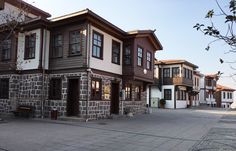 an empty street with several buildings on both sides