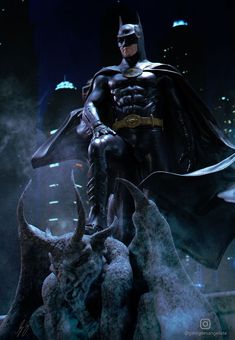 the batman statue is on display in front of a cityscape