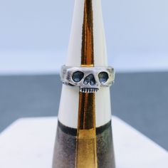 So I have a thing for skulls, and this one's quirky, cute and the right amount of edge. And, both guys & girls love this ring! Hand-carved in wax, then brought to life through the lost wax casting method. It's a pretty cool way to create jewelry, and very fitting for a skull! Made to order in Brass, Bronze, Sterling Silver, and ** NEW ** Gold Vermeil (14k Yellow Gold over Sterling). If you would like to order this ring in 14k or 18k solid gold, please contact me for a quote. *Visit the FAQ page Collectible Hand Cast Skull Rings, Symbolic Hand Cast Skull Ring, Unique Hand Cast Skull Rings, Symbolic Hand-cast Skull Ring Gift, Hand Cast Sterling Silver Skull Ring, Unique Hand-cast Skull Ring, Unique Adjustable Hand Cast Skull Ring, Hand Cast Skull Ring Gift, Hand Cast Skull Ring For Gift