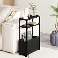 Perfect as a side table in the living room or a bedside table in the bedroom, it offers generous storage without taking up too much room. Ebern Designs | Ebern Designs Slim End Tables w / Fabric Basket, Skinny Table for Small Spaces in Black | 25.6" H X 15.6" W X 7.1" D | Wayfair Table For Small Space, Living Room End Tables, Fabric Baskets, Shelf Organization, Duvet Comforters, Mudroom Furniture, Office Furniture, Room Furniture, Patio Furniture