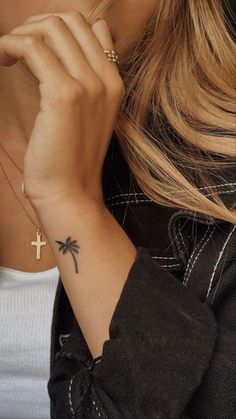 50 Best Small Travel Tattoos Ideas That Will Inspire Inner Wanderers Palm Tree Tattoo Side Of Wrist, Small Palm Tattoos For Women, Palm Tree Tattoo On Wrist, Palm Tree Tattoo On Finger, Small Palm Tree Tattoo Wrist, Matching Tattoos Women, Small Palm Tree Tattoos For Women, Little Palm Tree Tattoo, Beach Tatoos Woman