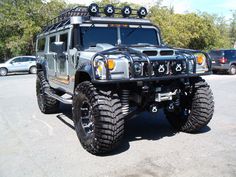 a large gray truck parked in a parking lot