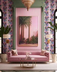 a living room with pink couches and palm trees on the wall