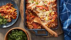 a casserole dish with meat, vegetables and cheese