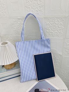 BagForLove - Korean Style Plaid Pattern Tote Bag - New Arrival for a Polished Casual Look Product Description Color Blue Pattern Type Plaid Bag Size Small Type Shoulder Tote Bag Material Fabric Composition 100% Polyester Size Chart INCH CM Bag Length Bag Width Bag Height Handle Height 12.6 inch 0.8 inch 14.2 inch 9.1 inch Bag Length Bag Width Bag Height Handle Height 32 cm 2 cm 36 cm 23 cm Details Pictures Similar Products h2 { text-align: center; } /* æ¢è¡ */ li{ white-space: normal; word-break: break-all; word-wrap: break-word; } .red-box { width: 100%; display: flex; flex-direction: row; flex-wrap: wrap; justify-content: center; } .red-box > div { width: 190px; height: 250px; margin: 10px; } .red-box > div > a > img { width: 190px; height: 250px; } .size-box { width: 100%; margin: aut Plaid Bag, Plaid Tote Bag, Polished Casual, Plaid Tote, Purple Pattern, Tote Pattern, Word Wrap, Tote Bag Pattern, Plaid Fashion