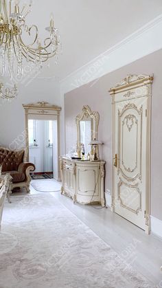 an ornately decorated living room with chandelier and white carpeted flooring