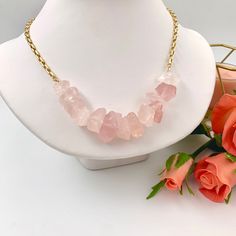 Discover the beauty and healing energy of our Raw Rose Quartz Necklace. Handcrafted with love and care, this natural crystal jewelry piece is not only a stunning accessory but also a powerful tool for self-love. Rose Quartz. The fair and lovely Rose Quartz, with its gentle pink essence, is a stone of the heart, a Crystal of Unconditional Love. It carries a soft feminine energy of compassion and peace, tenderness and healing, nourishment and comfort. ♥ ITEM DETAILS: Total Length: 16 17 - 18 - 19 Raw Rose Quartz Necklace, Raw Stone Necklace, Raw Rose Quartz, Raw Crystal Necklace, Rose Quartz Necklace, Rose Quartz Stone, Necklace Rose, Rose Quartz Crystal, Quartz Rose