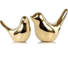 pair of gold bird shaped salt and pepper shakers