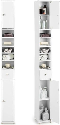 two tall white storage cabinets next to each other