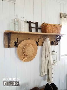 a wooden shelf with hats and other items hanging on it's sides, next to a pair of shoes