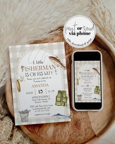 a cell phone sitting on top of a wooden table next to a card that says fishermanman is for big way