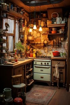 an old fashioned kitchen with lots of pots and pans on the stove top oven