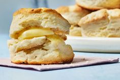 a biscuit is cut in half on a plate