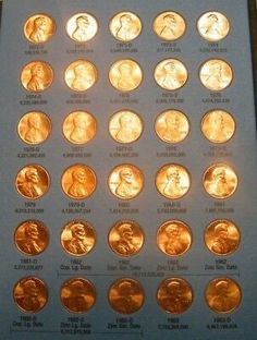 a collection of gold lincoln dollars