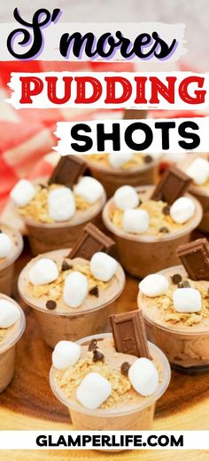 s'mores pudding shots on a plate with marshmallows and chocolate