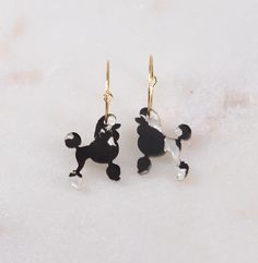 Playful Party poodle Earrings - Lightweight Acrylic - marble acrylic Style Galore! 💜 Description: Super cute Poodle earrings, These lightweight beauties are crafted from black and white marbled acrylic, adding a touch of fun to your ensemble. Designed for both style and comfort, these earrings are the perfect accessory to flaunt bold, eye-catching style all day long. 🌟 Key Features: Charming Design: Adorned with marbled accents, these earrings feature playful Standard poodle that are sure to delight. Perfect for adding a whimsical touch to your outfit! Premium Quality: Crafted from high-quality acrylic, these earrings offer both durability and style, ensuring you can shine bright all day long. Lightweight and Comfortable: With their lightweight design, these earrings are easy to wear and Poodle Earrings, Cat Design Metal Drop Earrings, Gold Cat Earrings, Black Cat Design Drop Earrings, Poodle Jewelry, Dog Earrings, Standard Poodle, Acrylic Earrings, Cozy Sweaters