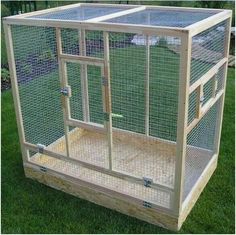 a large wooden chicken coop with two doors