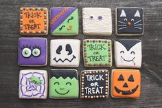 decorated cookies are arranged in the shape of halloween treats