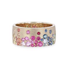 This cigar band showcases scattered rainbow-colored sapphires, uniting for a total of 1.36 carats. Its width spans 8.7 millimeters, making a bold statement. Wear this band proudly as a symbol of positivity and diversity, your little piece of the rainbow. Wedding Bands For Women, Men's Wedding Rings, Unique Wedding Ring, Diamonds Direct, Rainbow Sapphires, Wedding Rings Unique, Creative Jewelry, Bags Accessories, Diamond Wedding Bands