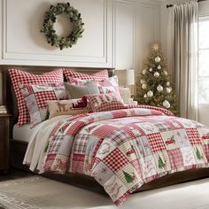 a christmas themed bed with red and white plaid comforter, pillowcases and pillows