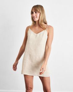 Our signature 100% French Flax Linen Slip is easygoing loungewear perfected. Simple, functional, and effortless, our slips are mini-length and oversized to ensure maximum comfort. Featuring a low back, v-shaped neckline, and adjustable spaghetti straps, these pure linen slips are light, breathable, and guaranteed to deliver you the perfect night’s sleep. Linen Sleepwear, Bed Threads, Linen Midi Dress, Fitted Mini Dress, Linen Mini Dress, Indian Textiles, Strappy Dresses, Pure Linen, Spaghetti Strap Dresses