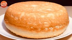 a close up of a cake on a plate with words above it that reads make bread in pan like a pro