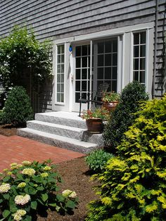 a house with steps leading up to the front door