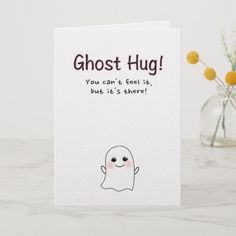 a card that says ghost hug you can't tell it, but it's there