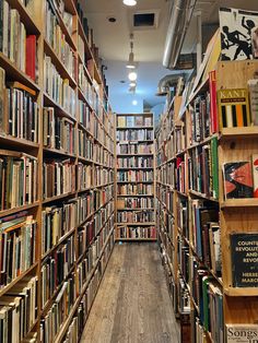 a long row of bookshelves filled with lots of books