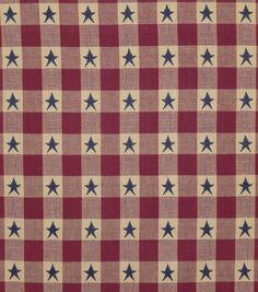 a red and white checkered fabric with blue stars on it