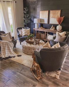 a living room filled with furniture and decor