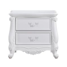 a white dresser with two drawers on it