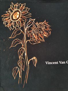 an embroidered sunflower on a black background with the words, innocent van goghn