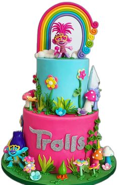 there is a colorful cake with the name troll on it