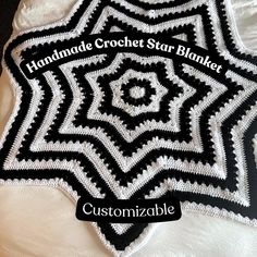 the crochet star blanket is black and white