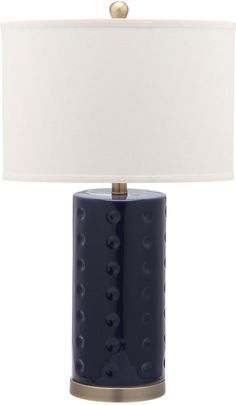 a blue table lamp with a white shade