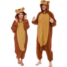 Look un-bear-ably cute in this Plush Teddy Bear Animal One Piece Pajamas from Funziez! Lounge around in comfort with these soft 100percent polyester onesies or wear it outside of your home for any occasion. You will look just like a cuddly teddy bear with the embroidered hood and adorable tail that no detail has gone unnoticed. Its loose fit allows for freeing movement, and the zippered front pockets provide functionality to keep your personal belongings close. The button up closure will help yo Tlt Musical, Onesie Halloween Costume, Sloth Onesie, Animal Halloween Costumes, Onesie Costumes, Animal Pajamas, Halloween Onesie, Union Suit, Cuddly Teddy Bear