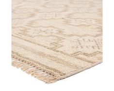 a beige and white rug with fringes on the bottom, in front of a white background