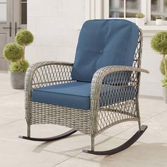 Relax in style and enjoy beauty of outdoor space with this Rocking Chair. Made with handwoven resin wicker over a sturdy metal frame, this chair is weather-resistant and built to last. The plush seat and back cushions provide added comfort. Octans Anastasia Wicker Gray Steel Frame Rocking Chair with Blue Cushioned Seat Polyester | SL2C00047 Grey Cushions, Patio Chairs, Rocking Chair, Relaxed Style, Steel Frame, Seat Cushions, Weather Resistant, Outdoor Space, Metal Frame