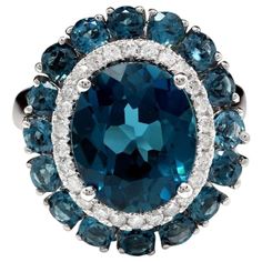 8.45 Carats Natural Impressive London Blue Topaz and Diamond 14K White Gold Ring Total Natural London Blue Topaz Weight: Approx. 8.00 Carats Center Topaz Weight is Approx. 7.00 Carats Center London Blue Topaz Measures: Approx. 12.00 x 10.00mm Natural Round Diamonds Weight: Approx. 0.45 Carats (color G-H / Clarity SI1-SI2) Ring size: 7 (we offer free re-sizing upon request) Ring total weight: Approx. 6.7 grams Disclaimer: all weights, measurements and colors are approximate and may vary slightly Emerald Cut Aquamarine Ring, Emerald Cut Rings, Gold Cocktail Ring, Blue Sparkles, Pink Topaz, 14k White Gold Ring, Pretty Rings, White Gold Ring, London Blue Topaz