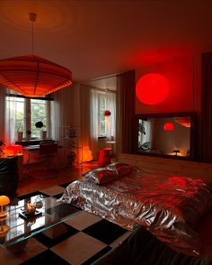 a bedroom with red lights and black and white checkered flooring