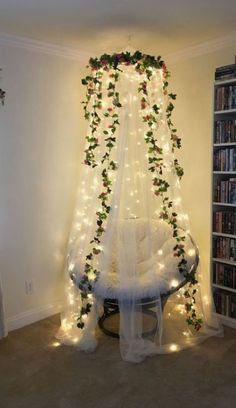 a room decorated with christmas lights and decorations