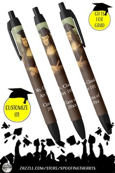 three pens with graduation pictures on them