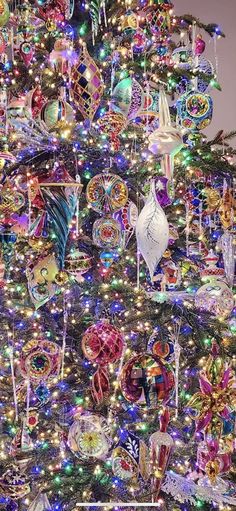 a christmas tree decorated with ornaments and lights