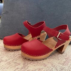 Mia Abba Clogs. New Without Tags, Never Worn. Size 36 (Us 6). Made In Sweden. Beautiful Red Leather Upper, Wood Footbed/Heel. Red Heels Clogs & Mules, Casual Red Closed Toe Clogs, Red Leather Platform Clogs, Red Summer Clogs With Wooden Heel, Red Clogs With Wooden Heel For Summer, Casual Red Mules With Wooden Heel, Spring Red Clogs With Wooden Heel, Red Mules With Wooden Heel And Round Toe, Red Leather Clogs With Wooden Heel