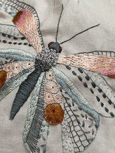 a close up view of an embroidered object